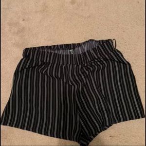 Black shorts with stripes